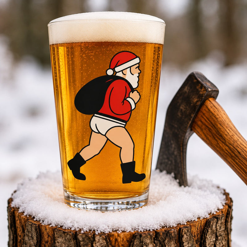 Nauti Claus Xmas Whities 16 oz pint glass printed with Santa with his sack stripped down to his white briefs