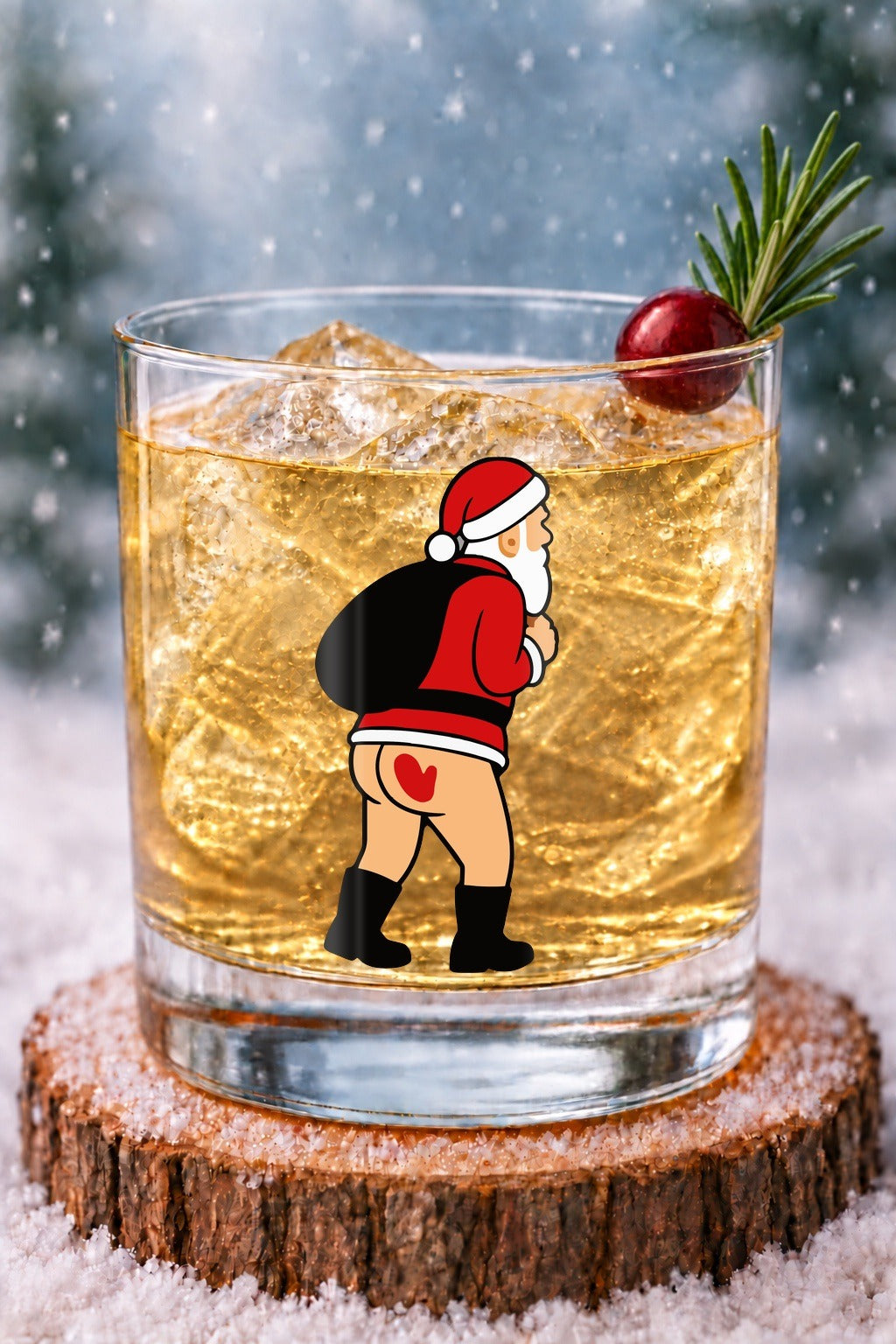 Nauti Claus Spanked 14 oz rocks glass with Santa with a heart cutout on his backside