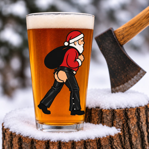 Nauti Claus Chaps 16 oz pint glass printed with sexy Santa with his sack wearing black leather chaps and a bare bottom